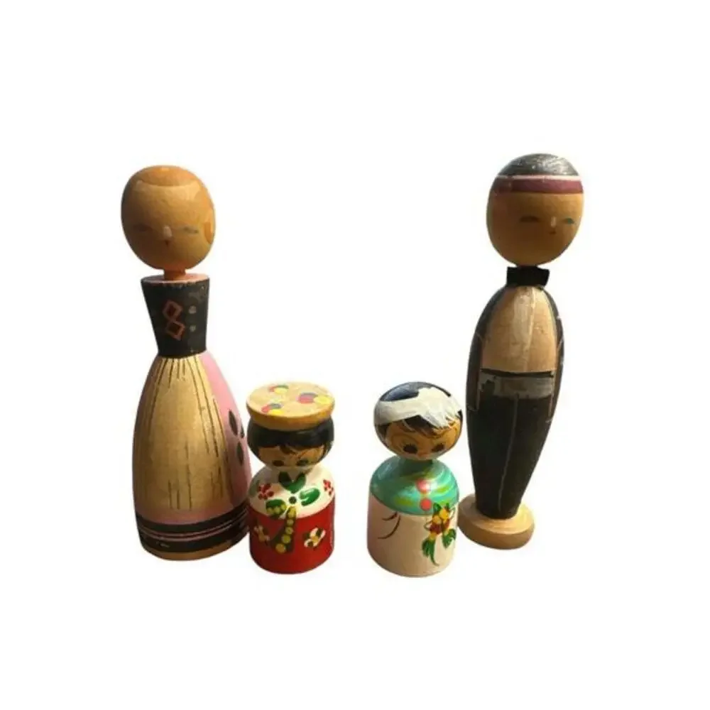 Vintage wood dolls size range from 4” to 2”